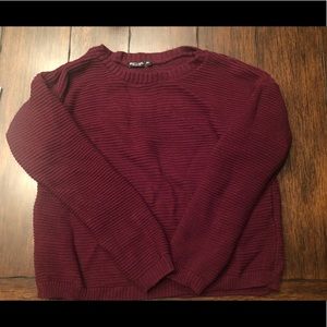 Knit sweater.